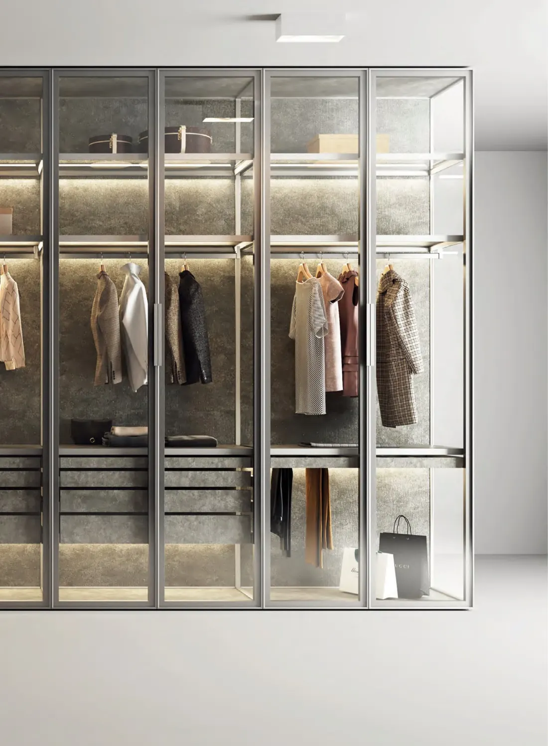 Glass-front wardrobe with lit shelves